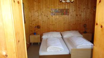 Schlafzimmer Ferienhaus Murmelegg
