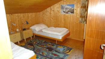 Schlafzimmer Ferienhaus Murmelegg