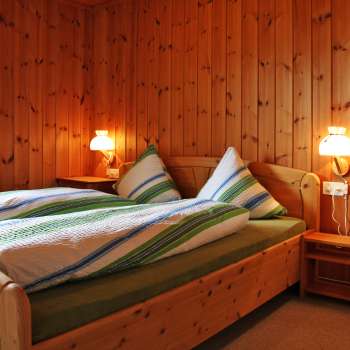 Schlafzimmer Ferienwohnung Beck (Hus Milbu)
