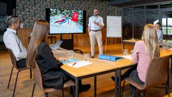 Impulsreferat mit Marco Büchel in einem Meetingraum